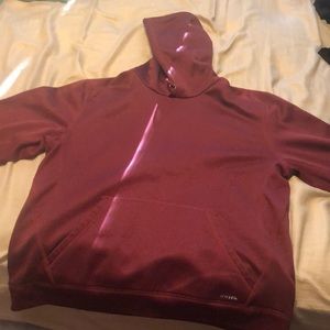 Maroon pull over jacket.